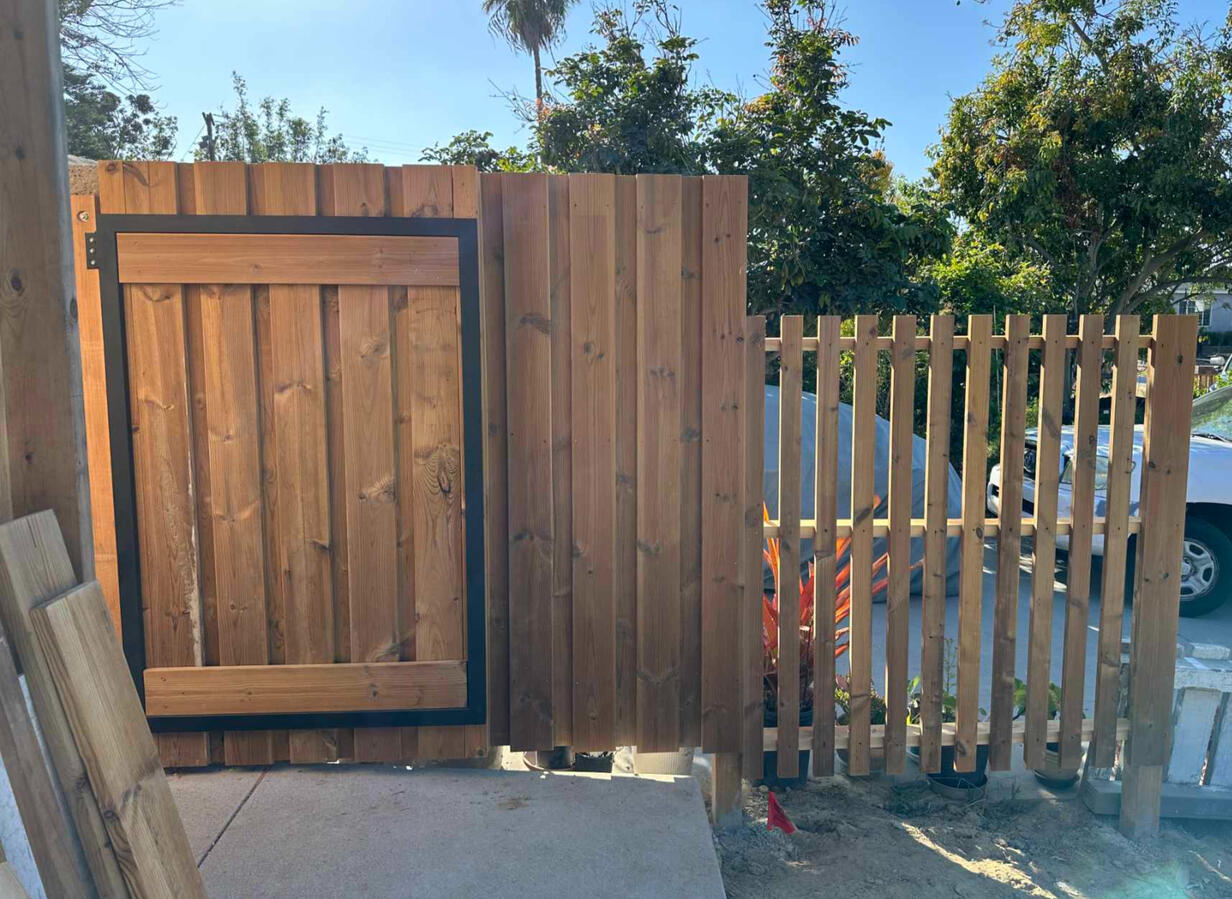Open gate, matched with siding and fence